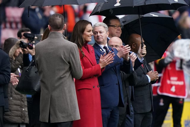 The Princess of Wales applauds  after singing the national anthem