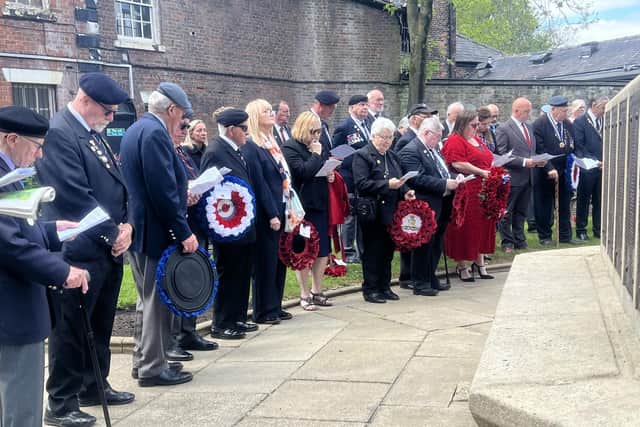 People gathered around the cenotaph for the service