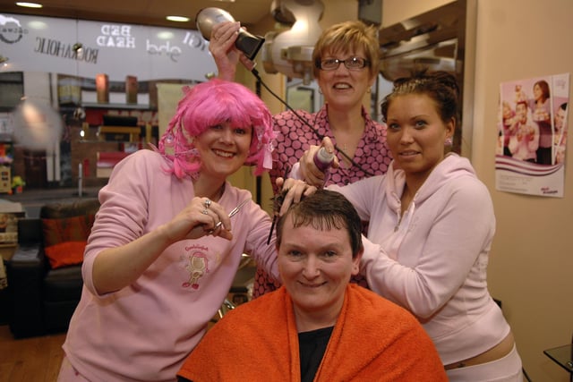 Staff at The Salon hairdressers, Ormskirk Road, Wigan dressed in pink pyjamas in aid of Breast Cancer. Pictured with customer Julie Teasdale are hairdressers Lisa Marsh, Yvonne Hepworth and Katie Lancaster