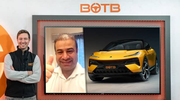 Dr Faheem Shah  receiving a mid-clinic video call from BOTB's Christian Williams telling him he'd won the swanky motor, before dashing off to see his next patient.