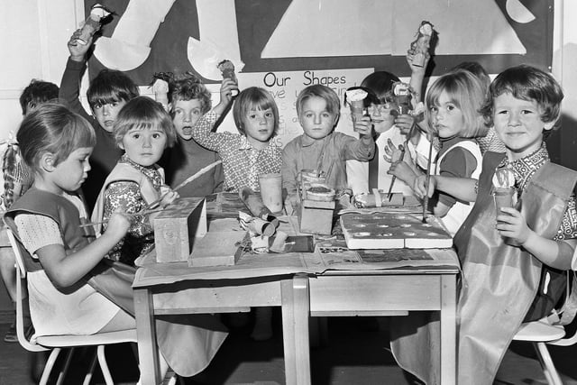 Reception children with puppets which they made at Woodfield Infants School on Wigan Lane in October 1971.