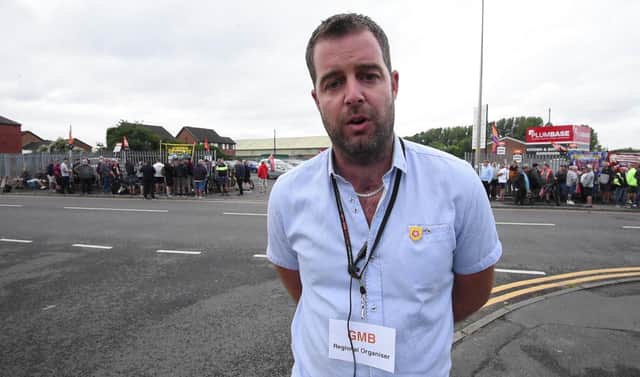 Workers from Pemberton Park and Leisure Homes LTD, Woodhouse Lane, Wigan, on the second day of strike action. Steven Whittle GMB regional organiser.