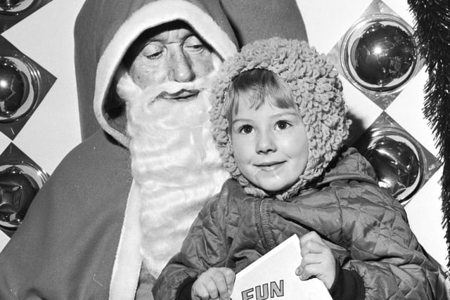 A youngster meets Santa in 1970s