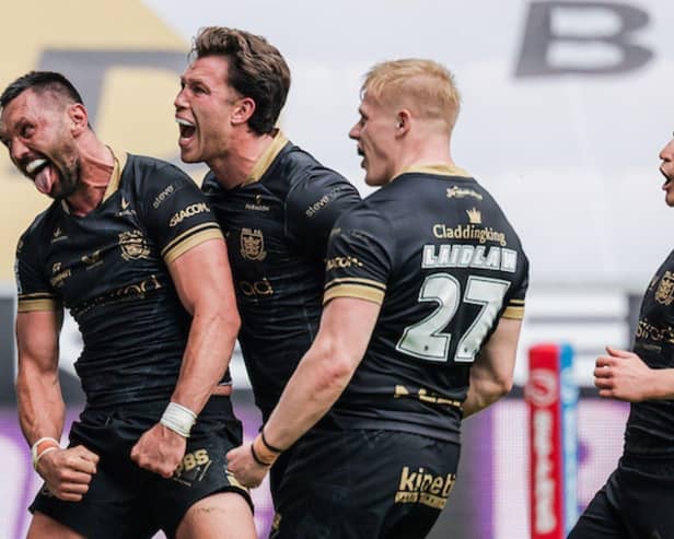 From left to right: Jordan Rapana, Yusuf Aydin, Matty Laidlaw and Will Hutchinson celebrate a Hull FC try against Wigan Warriors