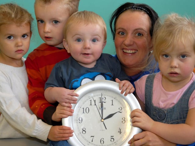 Cole Pemberton of Heron Day Nursery in Wigan learns how to turn back time with, left to right: Gracie Seddon, Harley Dale, Lyndsey Ralphson and Chloe Williams in 2009