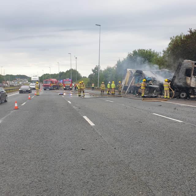 Fire crews working at the scene on the M6 in Preston this morning (Friday, July 29)