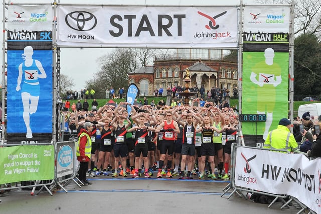 Action from the Run Wigan Festival 2024, with runners taking part in the half marathon.