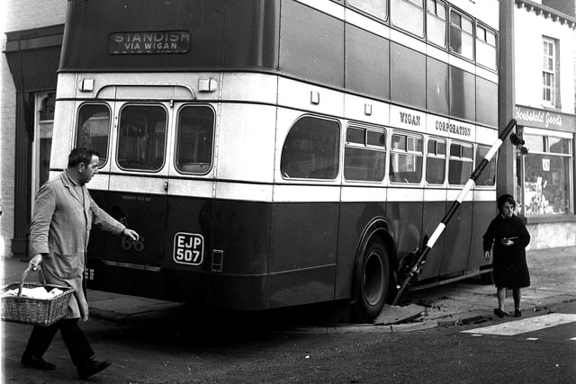 RETRO 1970 - The number 5A Wigan to Standish bus crashes into shops.