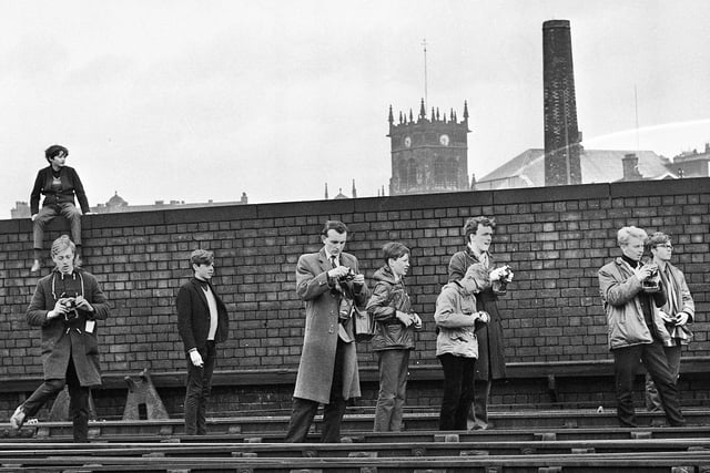 Enthusiasts gather to watch the last train, Tudor Minstrel, on its way to do the Waverley run from Carlisle to Edinburgh, pass through Wigan North Western Station in April 1966.