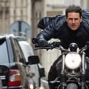 Tom Cruise in action during Mission Impossible 7. Filming was delayed due to the pandemic
