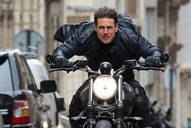 Tom Cruise in action during Mission Impossible 7. Filming was delayed due to the pandemic