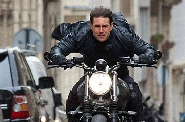 Tom Cruise in action during Mission Impossible 7. Filming was delayed due to the pandemic