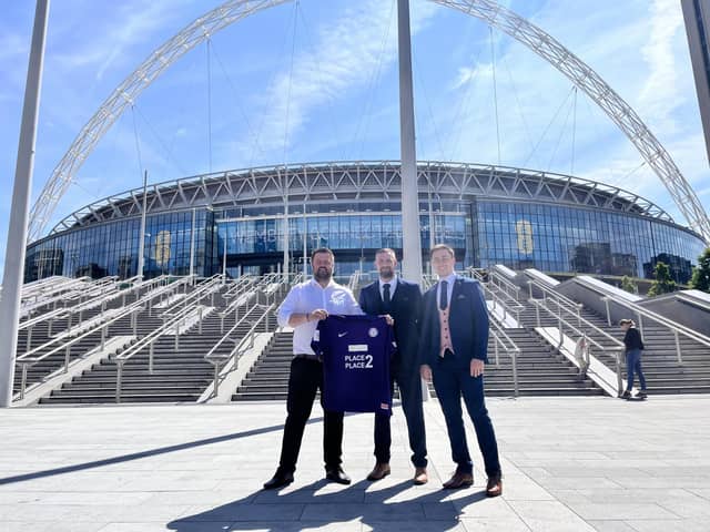 Peter Hill, Chris Shaw and Scott Westhead, who help run a charity with strong footballing connections drop in on Wembley Stadium