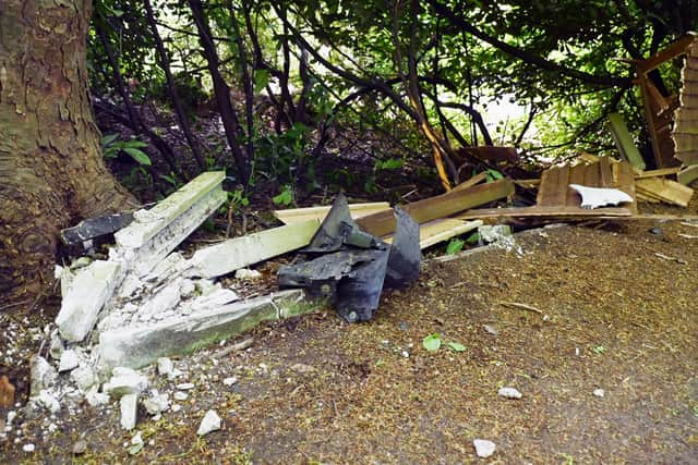 The fail to stop driver caused substantial damage outside the house in Kenyon Lane, Croft, near Lowton