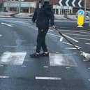 The man was seen walking the gull with a dog lead in Bispham on Monday, April 10. Pic credit: Alexander Faulkner