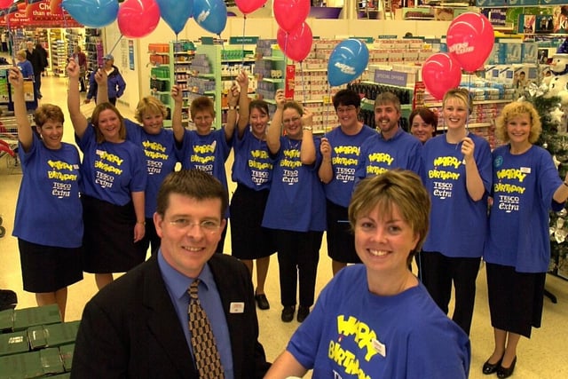 Staff at Tesco Extra, Central Park, Wigan, celebrates their first anniversary.