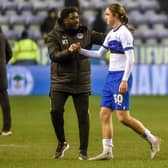 Kolo Toure  congratulates Thelo Aasgaard for his performance against Luton