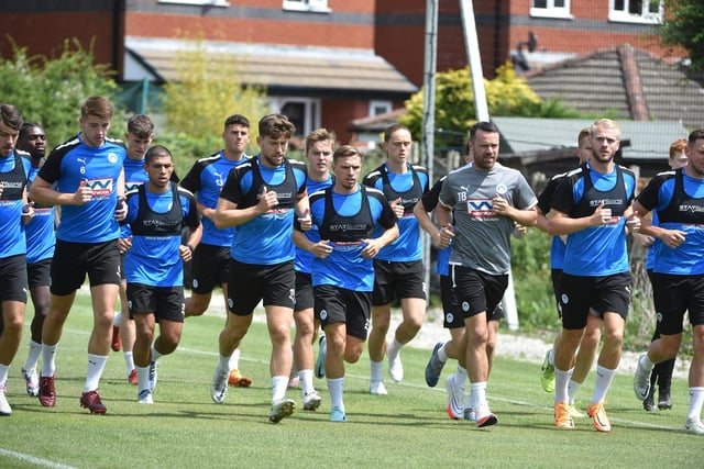 The Latics players are put through their paces