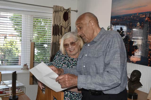 Billy Boston, pictured with wife Joan, as he learned he would be knighted. Picture by David Hurst