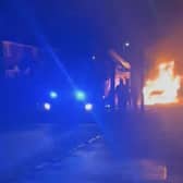 The car in flames on Rose Avenue, Beech Hill