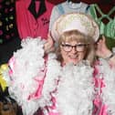 Caroline Joynt of the acclaimed Willpower Youth Theatre in Wigan, with some of the many stage costumes, vintage clothes and props for sale.