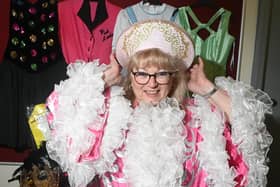 Caroline Joynt of the acclaimed Willpower Youth Theatre in Wigan, with some of the many stage costumes, vintage clothes and props for sale.