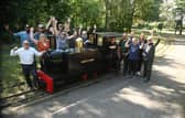 Celebrations as plans to restore Haigh Woodland Railway are back on track, thanks to Wigan Council investment.  Pictured are dedicated volunteers who form the Haigh Woodland Supporter's Association (HWRSA) with members of Wigan Council and ward councillors at Haigh Woodland Park.