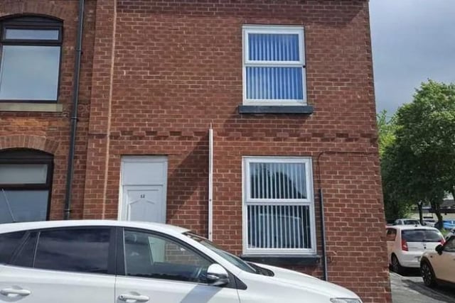 This two-bed terraced house is for sale at £100k