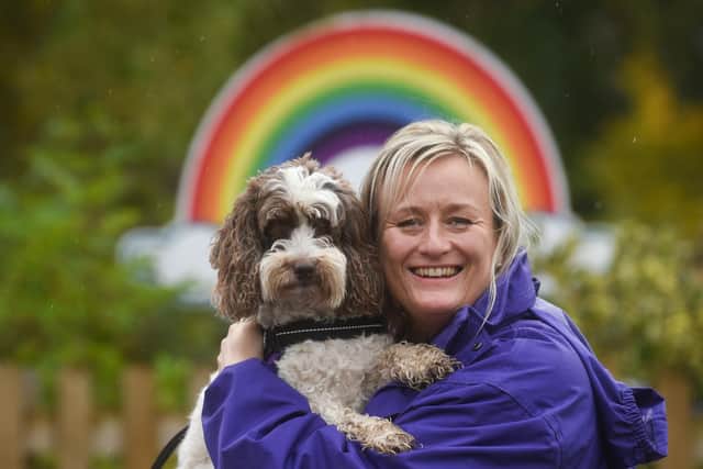 Ali Colley, founder of Hope's Therapy Dogs, with her daughter Hope's dog Pippa