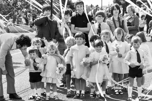 St. Peter's Sunday school line up at the Hindley combined walking day on Sunday 12th of June 1983.