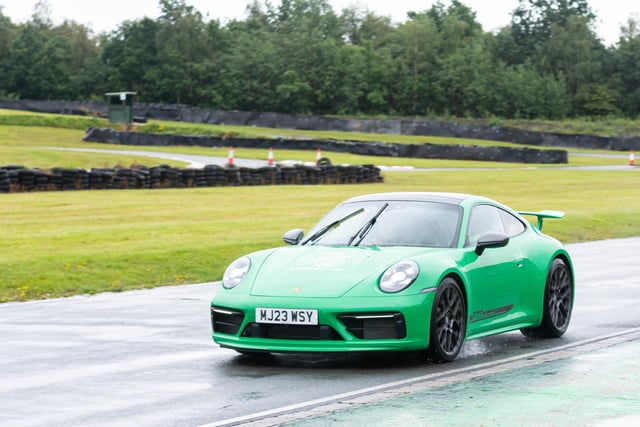 Visitors were treated to Porsche cars driving around the Three Sisters circuit