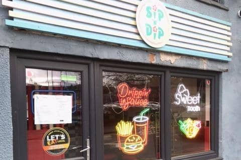 Sip 'N' Dip on Preston Road, Standish, with a bailiff's enforcement notice on the door