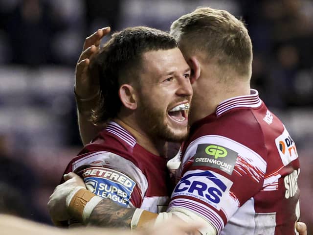 Cade Cust celebrates his try