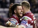 Cade Cust celebrates his try