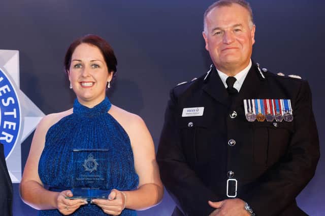 PCSO Michelle Ashurst with GMP chief constable Stephen Watson