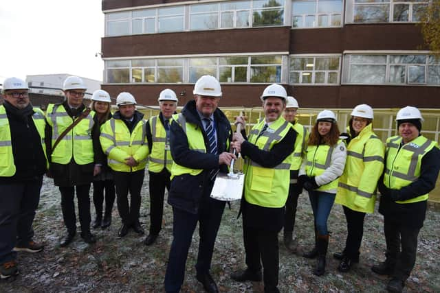 WWL chairman Mark Jones, front left, with Leigh MP James Grundy, front right, at the official ground-breaking ceremony to mark the work on the new Community Diagnostic Centre and Theatre Scheme at Leigh Infirmary.