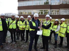 WWL chairman Mark Jones, front left, with Leigh MP James Grundy, front right, at the official ground-breaking ceremony to mark the work on the new Community Diagnostic Centre and Theatre Scheme at Leigh Infirmary.