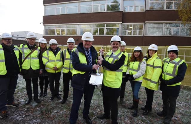 WWL chairman Mark Jones, front left, with Leigh MP James Grundy, front right, at the official ground-breaking ceremony to mark the work on the new Community Diagnostic Centre and Theatre Scheme at Leigh Infirmary.