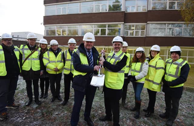 WWL chairman Mark Jones, front left, with Leigh MP James Grundy, front right, at the official ground-breaking ceremony to mark the work on the new Community Diagnostic Centre and Theatre Scheme at Leigh Infirmary.
