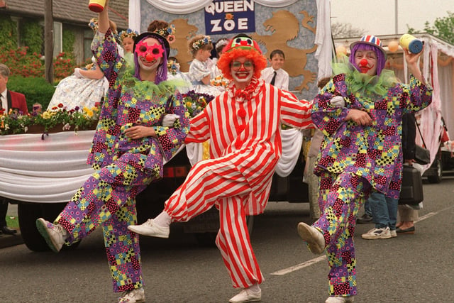 CLOWNING AROUND...Barbara Arnold, left, Ghislane Coleman and Sheila Lyon, of St Thomas' CE Church Sunday Club, get in the mood at the Golborne May Queen Carnival.  The three, members of the Carnival Committee, were collecting for St Thomas' School Building and Maintainance Fund.