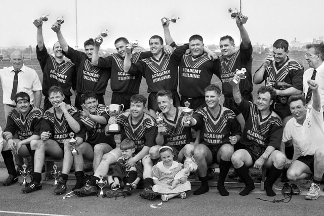 The successful St. Jude's amateur rugby league team with the trophy after beating Orrell St. James 24-14 in the Ken Gee Cup Final at Robin Park on Sunday 24th of May 1992.