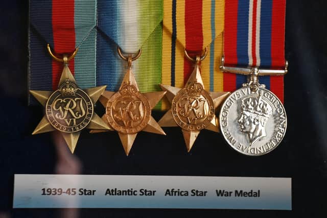 Replicas of Harry Melling's medals for display purposes