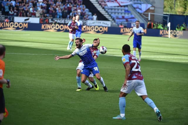 Graeme Shinnie in action against Burnley