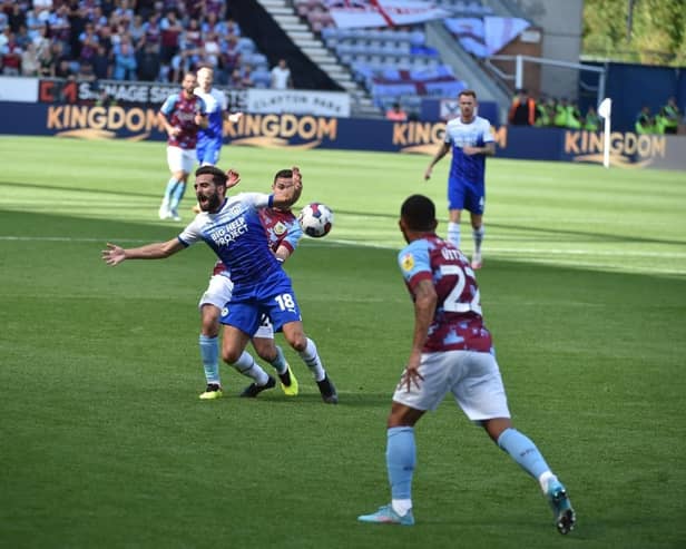 Graeme Shinnie in action against Burnley