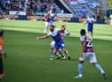 Graeme Shinnie in action against Burnley