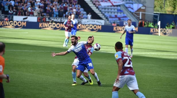 Graeme Shinnie in action against Burnley