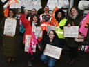 Teaching staff and supporters of the NE) on the picket line outside St Paul's CE Primary School in Goose Green