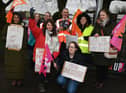 Teaching staff and supporters of the NE) on the picket line outside St Paul's CE Primary School in Goose Green