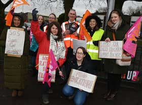 Teaching staff and supporters of the NE) on the picket line outside St Paul's CE Primary School in Goose Green