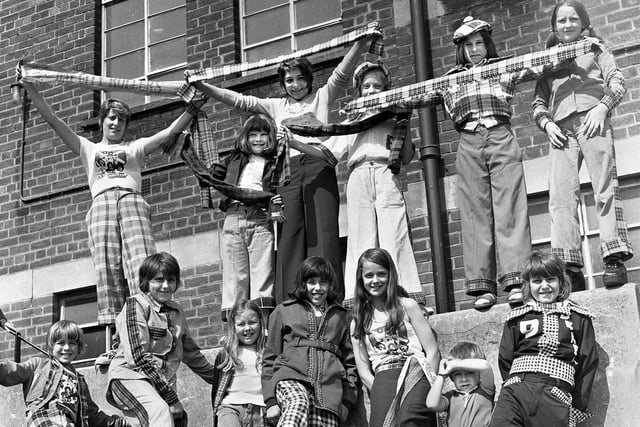 Scottish pop group the Bay City Rollers were all the rage in 1975 and here Wigan fans don the tartan at a fancy dress competition at the ABC Minors on Saturday 7th of June that year.